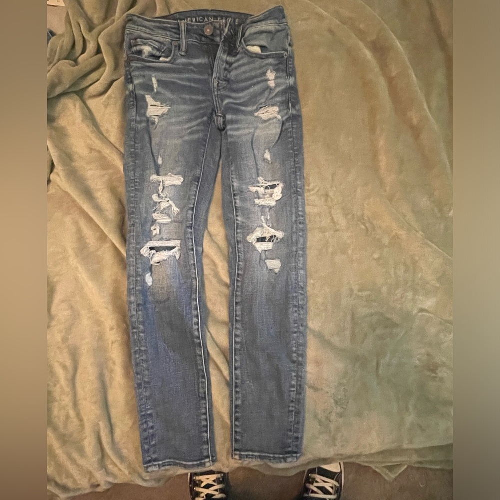 ripped low rise ( i think) Anerican Eagle jeans